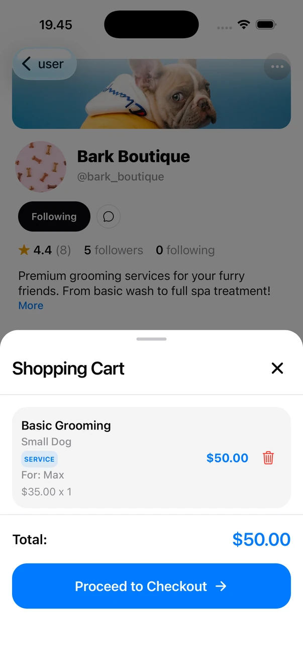 Shopping cart showing a grooming service booked at Bark Boutique for Max the dog